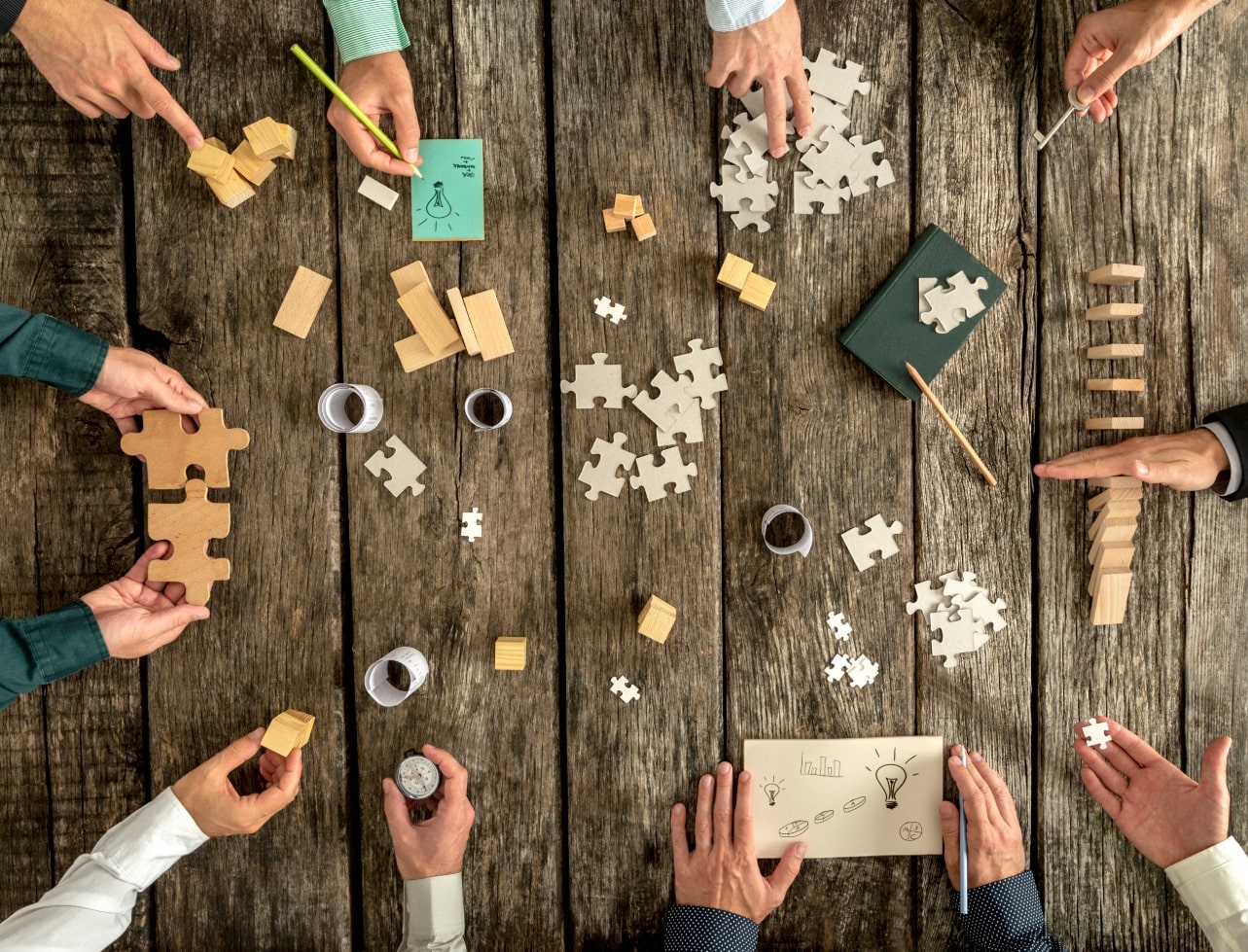 Vision Factory team collaborating to deliver precision woodworking and manufacturing excellence